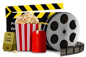 picture of a film clapper behind a ticket, box of popcorn, soda can, and film canister