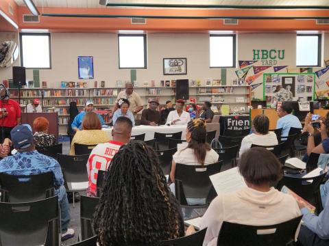 This picture a great image of library customers enjoying themselves at the annual Men's and Women's Conference.