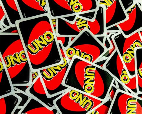 Uno playing cards scattered about.