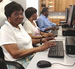 Teaching seniors the basic computer skills with iPad.