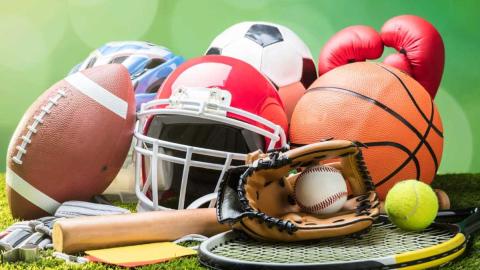 photo of various sport equipment with a green background