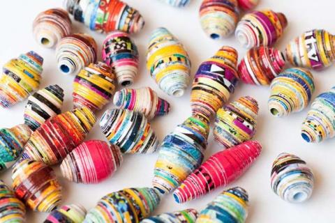 examples of paper beads in different colors, sizes, and styles