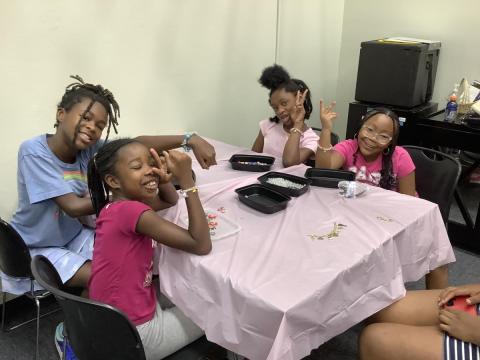 children making jewelry