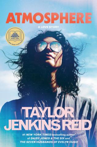 book cover with brunette woman looking up at sky