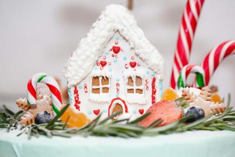 Frosted gingerbread and candy cane house