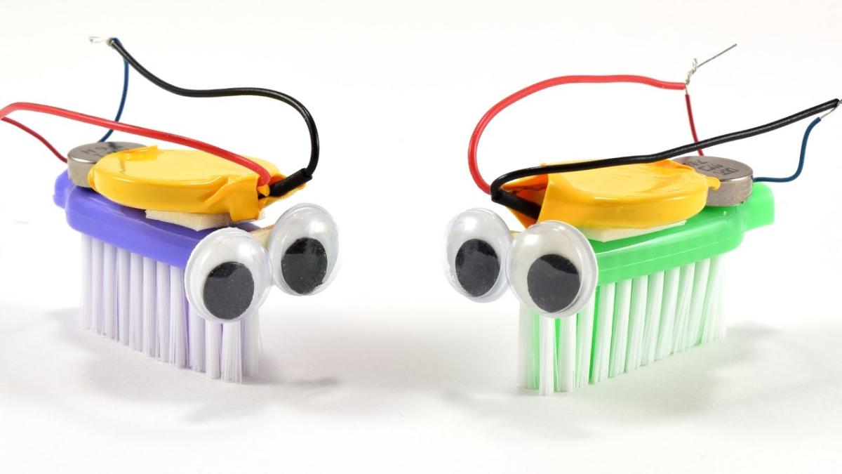 photo of two bristlebots (toothbrush robots)