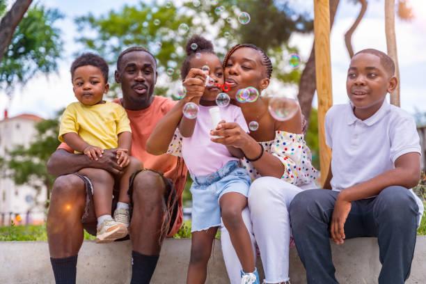 Family Blowing Bubbles 