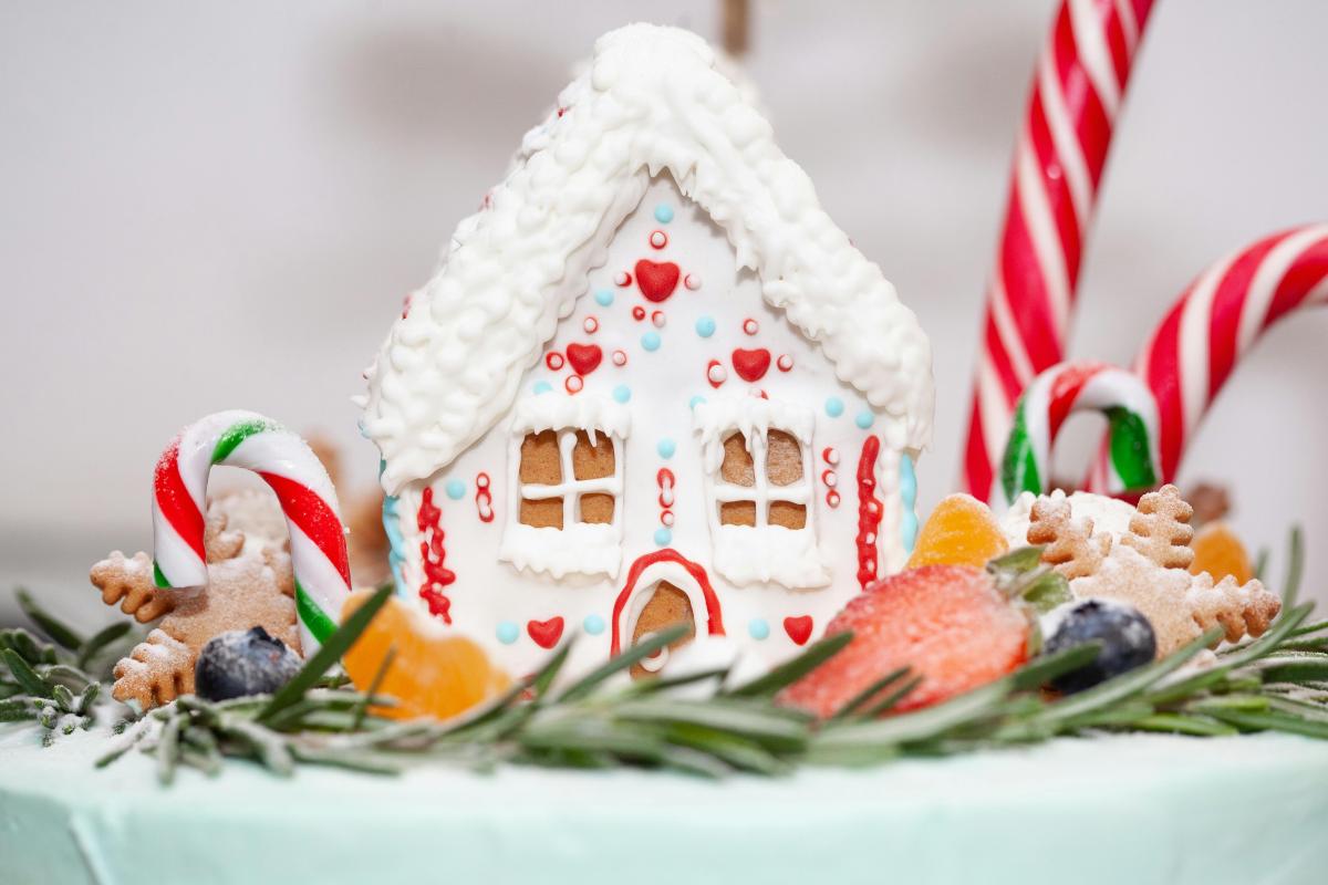 Frosted gingerbread and candy cane house